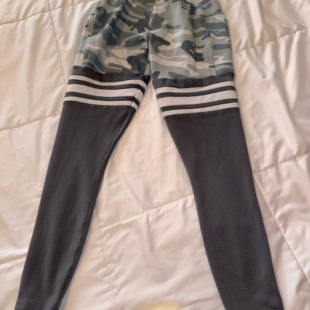 Bombshell Sportswear Gray and White Leggings with Striking Design